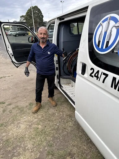 The Asaad van with the side door open