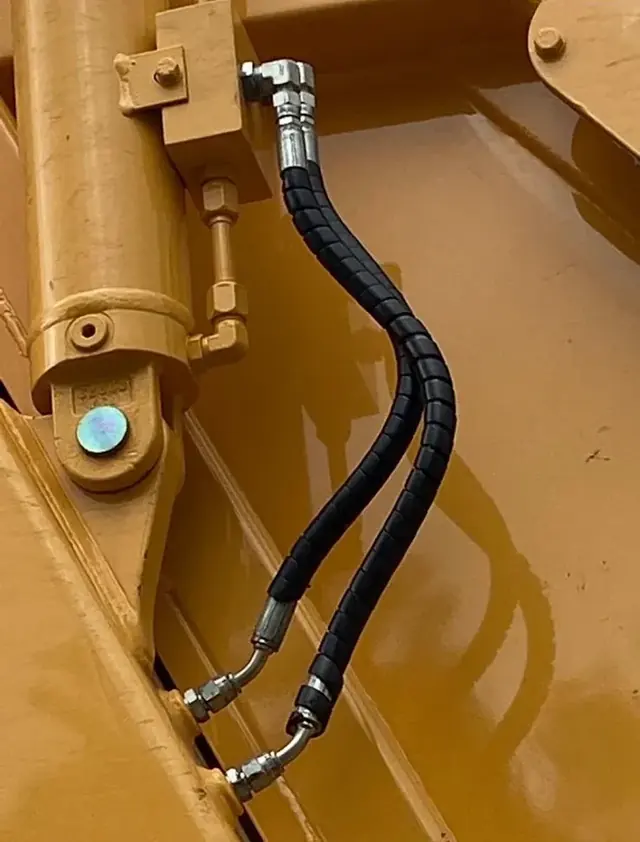 New hoses fitted to a yellow cylinder